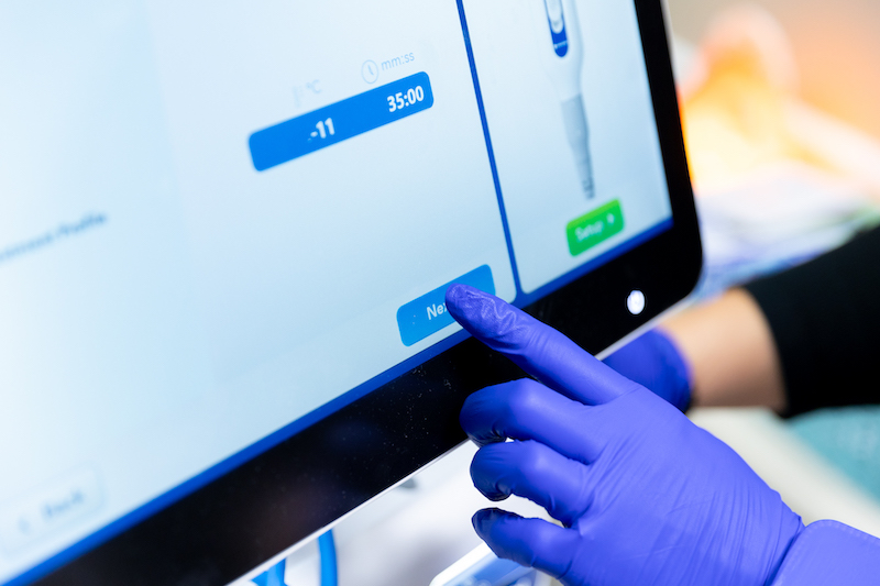A Restoration MedSpa types on a screen to help a patient prepare for CoolSculpting Elite near Summerfield.