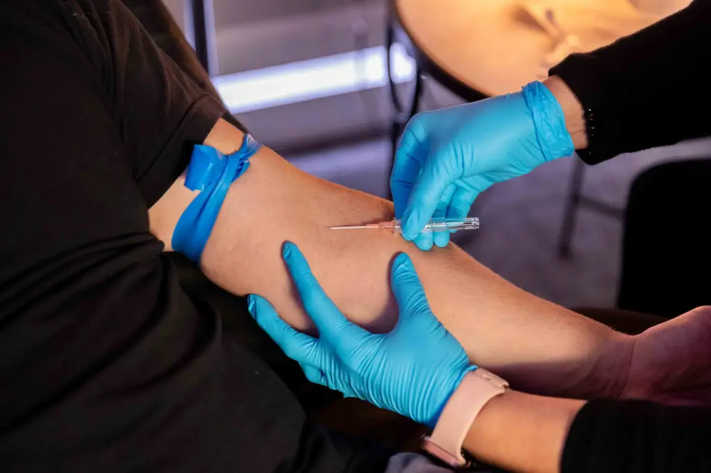 A Restoration MedSpa medical provider collects a blood sample from a patient's arm. We use this sample during BioTE bioidentical hormone replacement therapy (BHRT). As one of 6,000 certified BioTE® providers in the United States, we're the best med spa in Greensboro for hormone therapy.